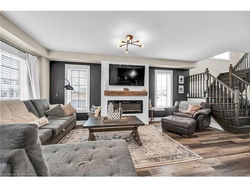 64 Arnold Marshall Boulevard, Caledonia, ON - Indoor Photo Showing Living Room With Fireplace