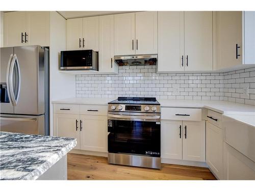 117 Thackeray Way, Harriston, ON - Indoor Photo Showing Kitchen With Upgraded Kitchen