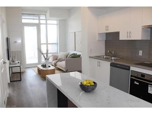 104-461 Green Road, Stoney Creek, ON - Indoor Photo Showing Kitchen With Double Sink
