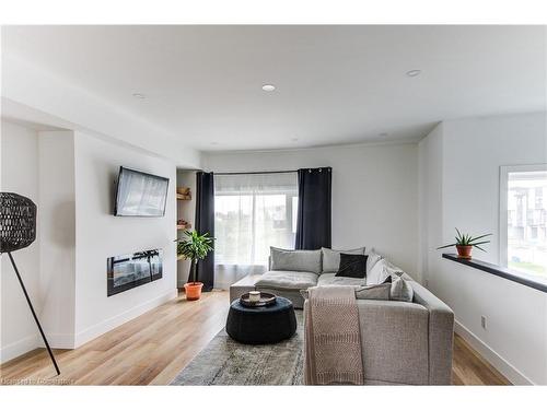 14-4222 Lismer Lane, London, ON - Indoor Photo Showing Living Room With Fireplace