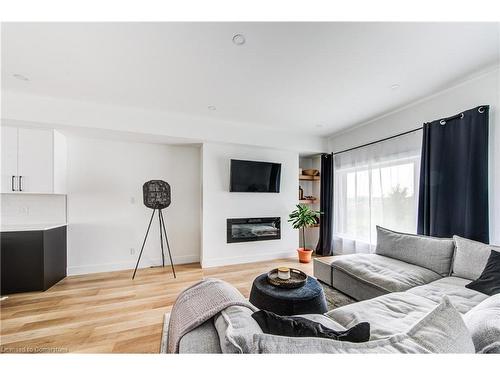 14-4222 Lismer Lane, London, ON - Indoor Photo Showing Living Room With Fireplace