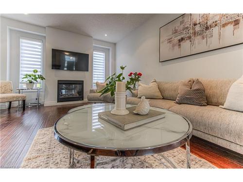 26 Spring Creek Street, Kitchener, ON - Indoor Photo Showing Living Room With Fireplace