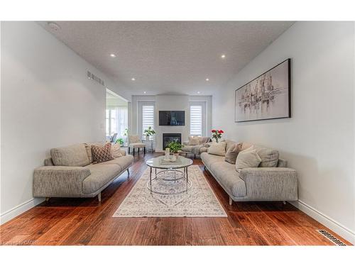 26 Spring Creek Street, Kitchener, ON - Indoor Photo Showing Living Room With Fireplace