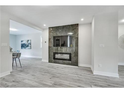 221 Rosslyn Avenue N, Hamilton, ON - Indoor Photo Showing Living Room With Fireplace