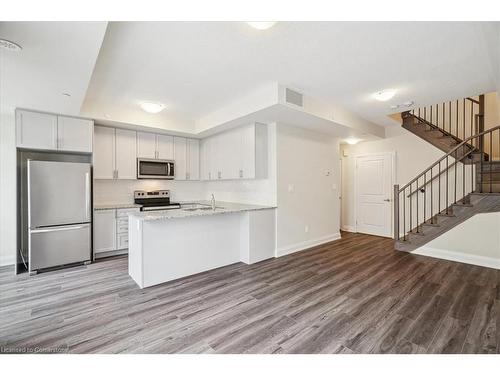 105-1593 Rose Way, Milton, ON - Indoor Photo Showing Kitchen
