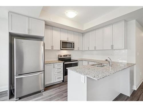 105-1593 Rose Way, Milton, ON - Indoor Photo Showing Kitchen With Double Sink With Upgraded Kitchen