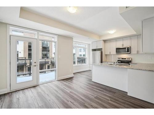 105-1593 Rose Way, Milton, ON - Indoor Photo Showing Kitchen