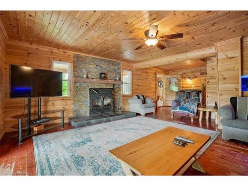 96 Charlotteville 2 Road, St. Williams, ON - Indoor Photo Showing Living Room With Fireplace