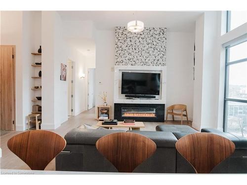 Lph13-118 King Street E, Hamilton, ON - Indoor Photo Showing Living Room With Fireplace