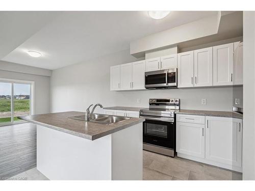 99 Elvira Way, Thorold, ON - Indoor Photo Showing Kitchen With Double Sink
