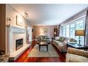 98 Hadley Drive, Ancaster, ON  - Indoor Photo Showing Living Room With Fireplace 