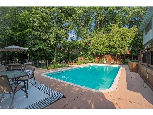 316 Fennell Avenue W, Hamilton, ON - Outdoor With In Ground Pool With Deck Patio Veranda With Backyard