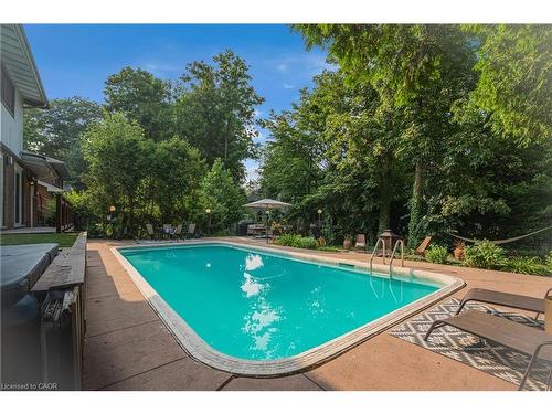 316 Fennell Avenue W, Hamilton, ON - Outdoor With In Ground Pool With Deck Patio Veranda With Backyard