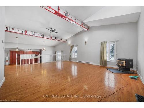 1632 Conc 2-3 Road, Cochrane, ON - Indoor With Fireplace