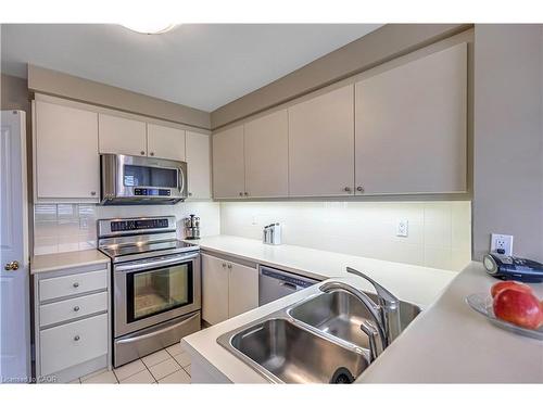 704-1800 The Collegeway, Mississauga, ON - Indoor Photo Showing Kitchen With Stainless Steel Kitchen With Double Sink