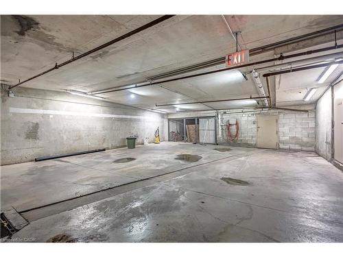 704-1800 The Collegeway, Mississauga, ON - Indoor Photo Showing Garage