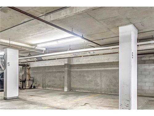 704-1800 The Collegeway, Mississauga, ON - Indoor Photo Showing Garage