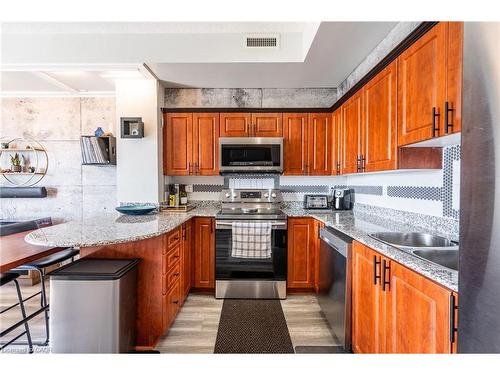 612-135 James Street S, Hamilton, ON - Indoor Photo Showing Kitchen With Double Sink