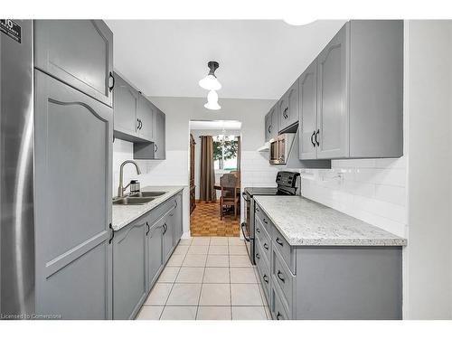 18-1460 Garth Street, Hamilton, ON - Indoor Photo Showing Kitchen With Double Sink