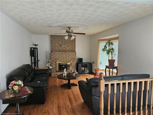 62 Landron Avenue, Hamilton, ON - Indoor Photo Showing Living Room With Fireplace