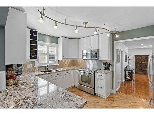 478 East 37Th Street, Hamilton, ON - Indoor Photo Showing Kitchen With Double Sink