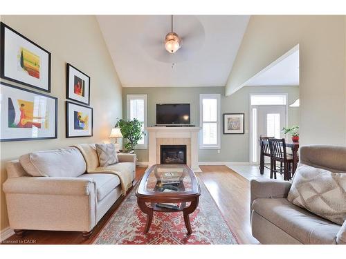 127-2125 Itabashi Way, Burlington, ON - Indoor Photo Showing Living Room With Fireplace