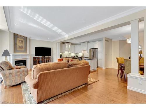 53-435 Winchester Drive, Waterloo, ON - Indoor Photo Showing Living Room With Fireplace