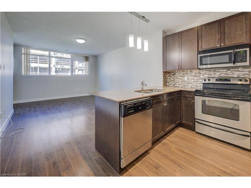 402-188 King Street S, Waterloo, ON - Indoor Photo Showing Kitchen With Double Sink