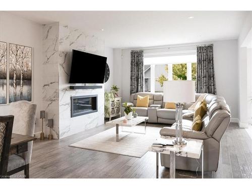 20 Festival Way, Binbrook, ON - Indoor Photo Showing Living Room With Fireplace