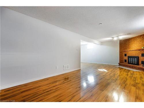 15 Gilcrest Street, Hamilton, ON - Indoor With Fireplace