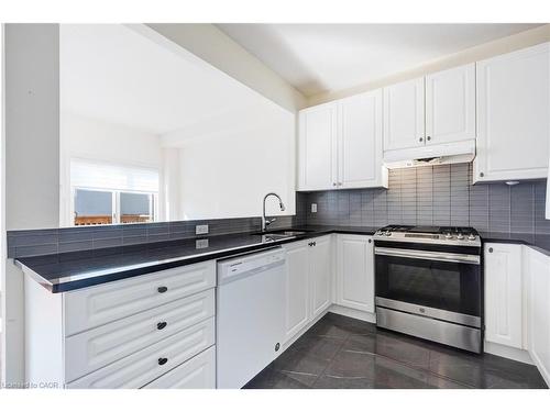 489 Downes Jackson Heights, Milton, ON - Indoor Photo Showing Kitchen With Upgraded Kitchen