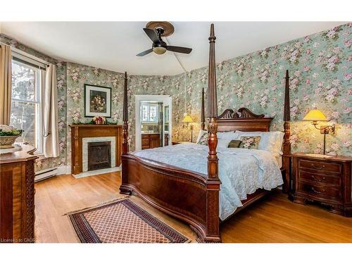 351 Bay Street S, Hamilton, ON - Indoor Photo Showing Bedroom With Fireplace