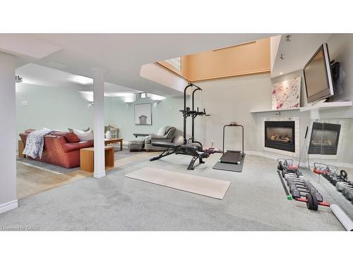 5570 Mcfarren Boulevard, Mississauga, ON - Indoor Photo Showing Gym Room With Fireplace