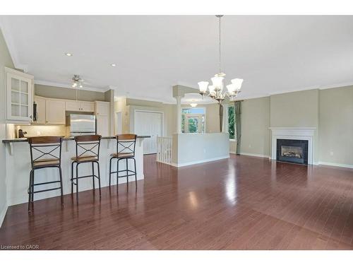 99-20 Isherwood Avenue, Cambridge, ON - Indoor Photo Showing Other Room With Fireplace