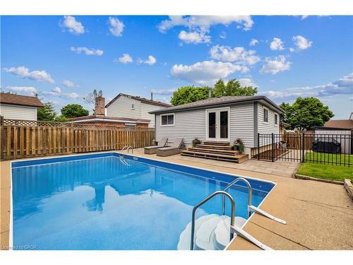 24 Queenslea Drive, Hamilton, ON - Outdoor With In Ground Pool With Deck Patio Veranda