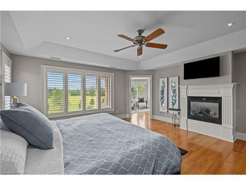 1532 Concession Rd 6 W, Flamborough, ON - Indoor Photo Showing Bedroom With Fireplace