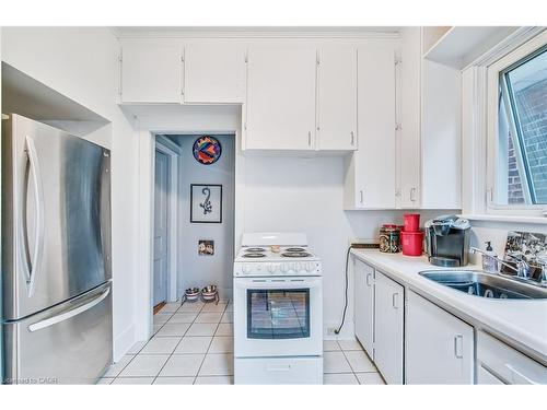 93 East 23Rd Street, Hamilton, ON - Indoor Photo Showing Kitchen With Double Sink