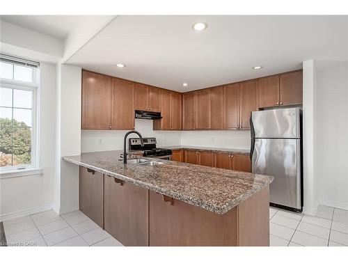 503-396 Plains Road E, Burlington, ON - Indoor Photo Showing Kitchen With Stainless Steel Kitchen With Double Sink