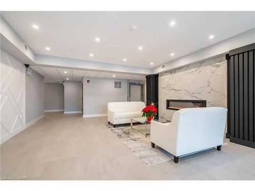 302-120 Springvalley Crescent, Hamilton, ON - Indoor With Fireplace