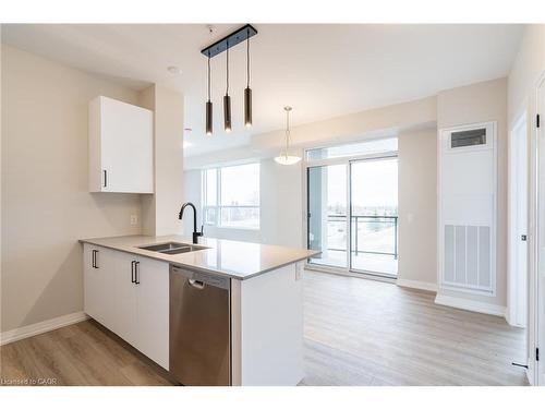 302-120 Springvalley Crescent, Hamilton, ON - Indoor Photo Showing Kitchen With Double Sink