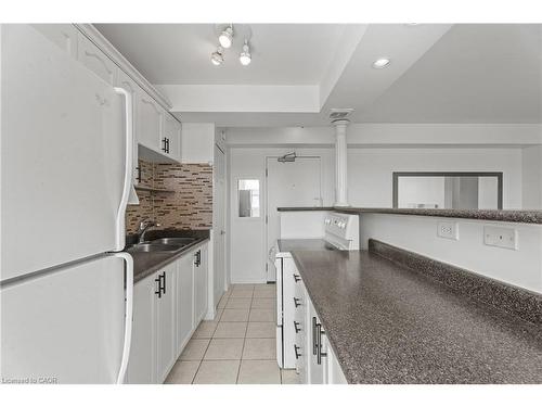 505-851 Queenston Road, Stoney Creek, ON - Indoor Photo Showing Kitchen With Double Sink