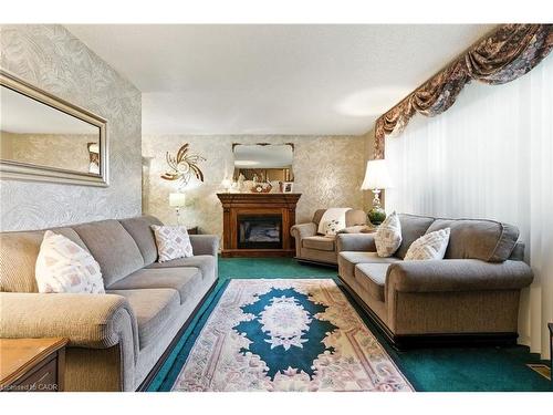 33 Bernard Street, Hamilton, ON - Indoor Photo Showing Living Room With Fireplace