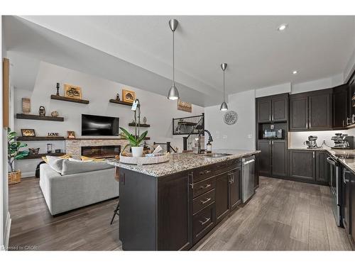 21-271 Grey Silo Road, Waterloo, ON - Indoor Photo Showing Other Room With Fireplace