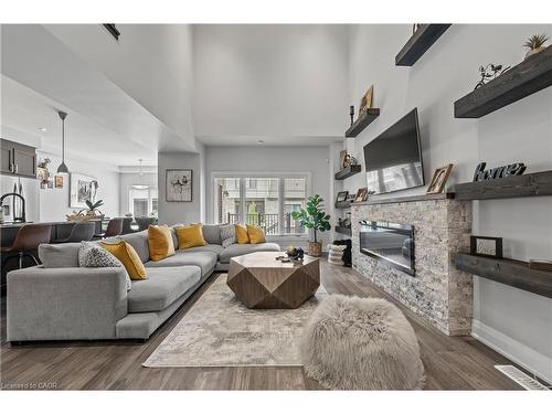 21-271 Grey Silo Road, Waterloo, ON - Indoor Photo Showing Living Room With Fireplace