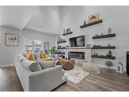 21-271 Grey Silo Road, Waterloo, ON - Indoor Photo Showing Living Room With Fireplace