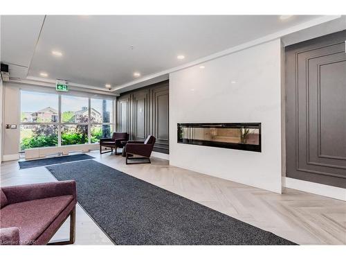 414-15 Prince Albert Boulevard, Kitchener, ON - Indoor Photo Showing Living Room With Fireplace