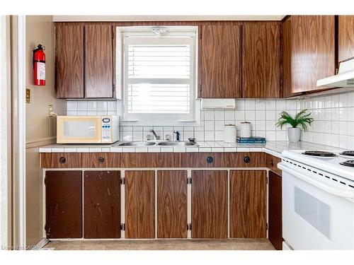 70 Poulette Street, Hamilton, ON - Indoor Photo Showing Kitchen With Double Sink
