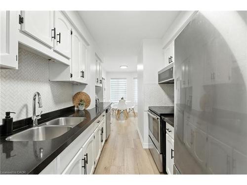 4-2252 Walkers Line, Burlington, ON - Indoor Photo Showing Kitchen With Double Sink