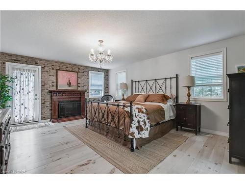 1097 Mineral Springs Road, Ancaster, ON - Indoor Photo Showing Bedroom With Fireplace