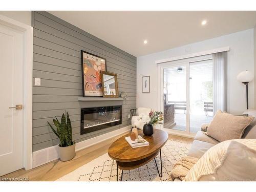 A-225 East 24Th Street, Hamilton, ON - Indoor Photo Showing Living Room With Fireplace